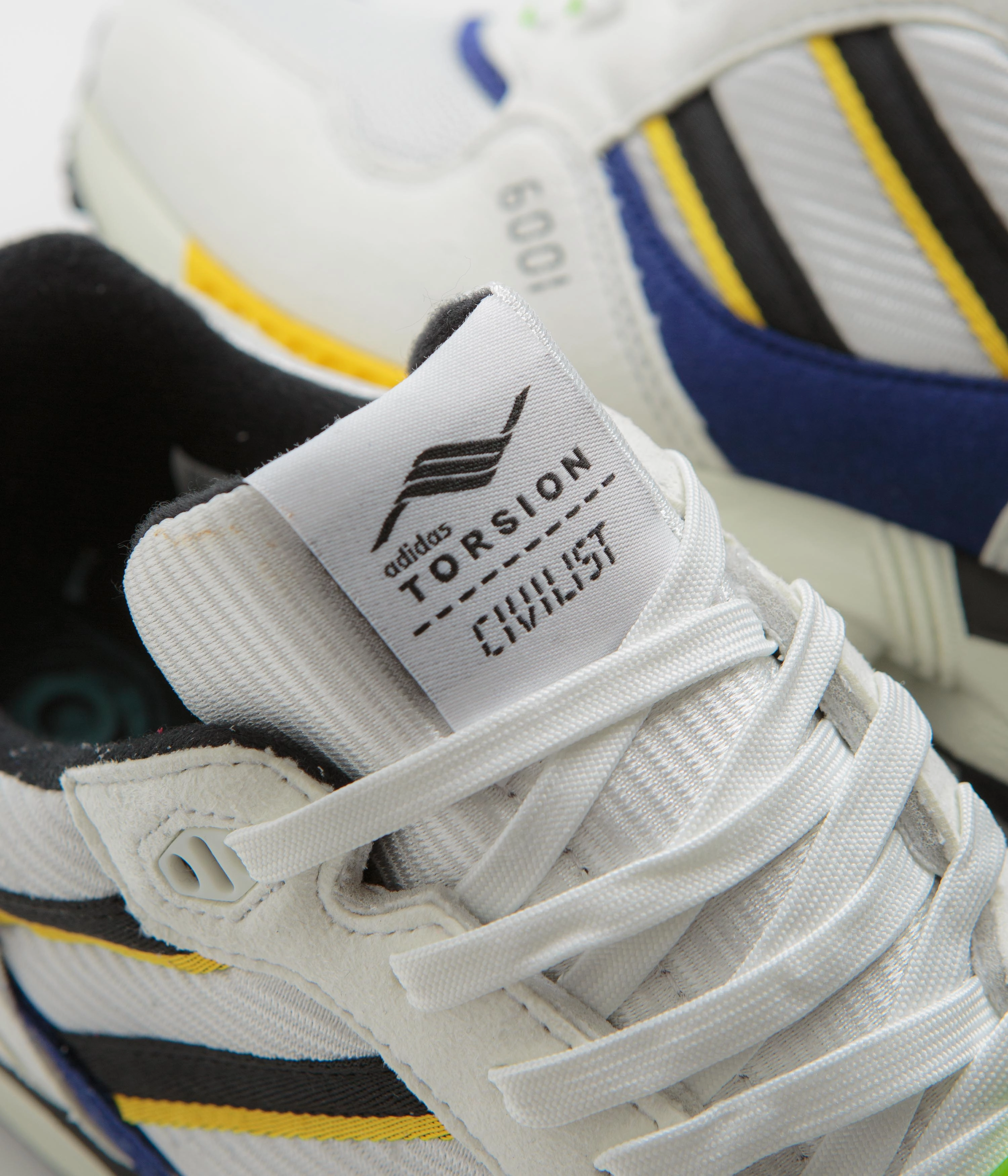 Adidas Samba Cheetah Shoes Adidas x Civilist ZX 6001 B Shoes - Crystal White / Core Black / Bold Gold