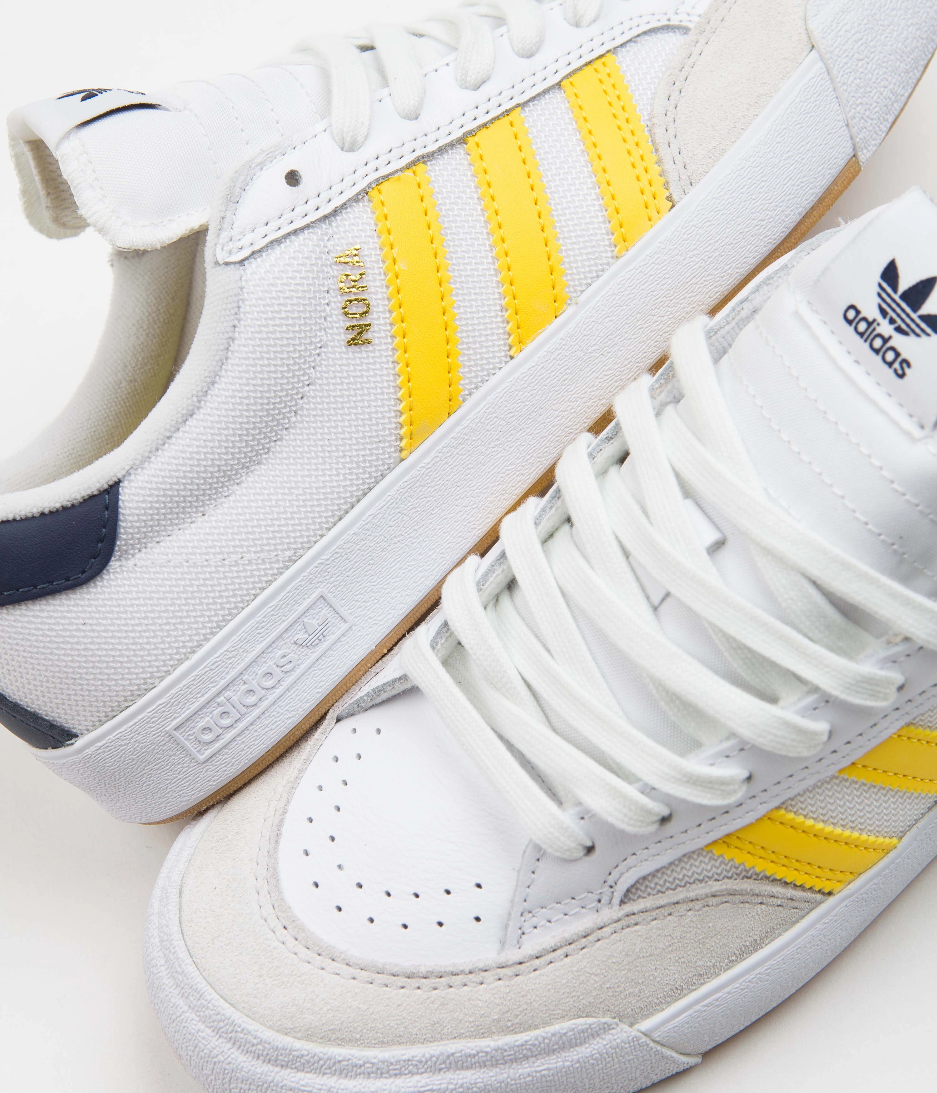 Adidas Super Sleek 72 Shoes Adidas Nora Shoes - FTWR White / Bold Gold / Collegiate Navy
