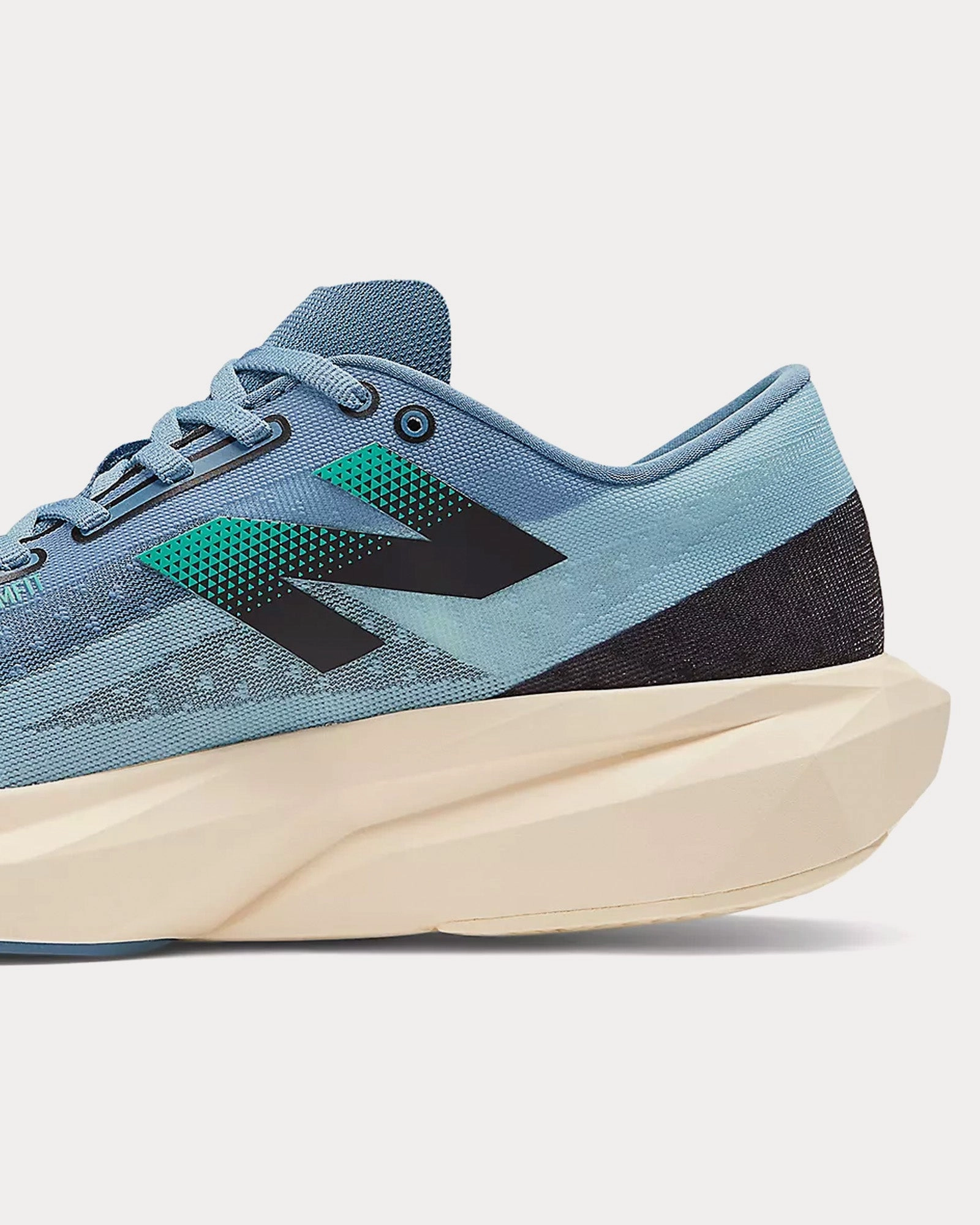 New Balance Outlet Maine Skowhegan FuelCell Rebel v4 Heron Blue / Chrome Blue / Black Running Shoes