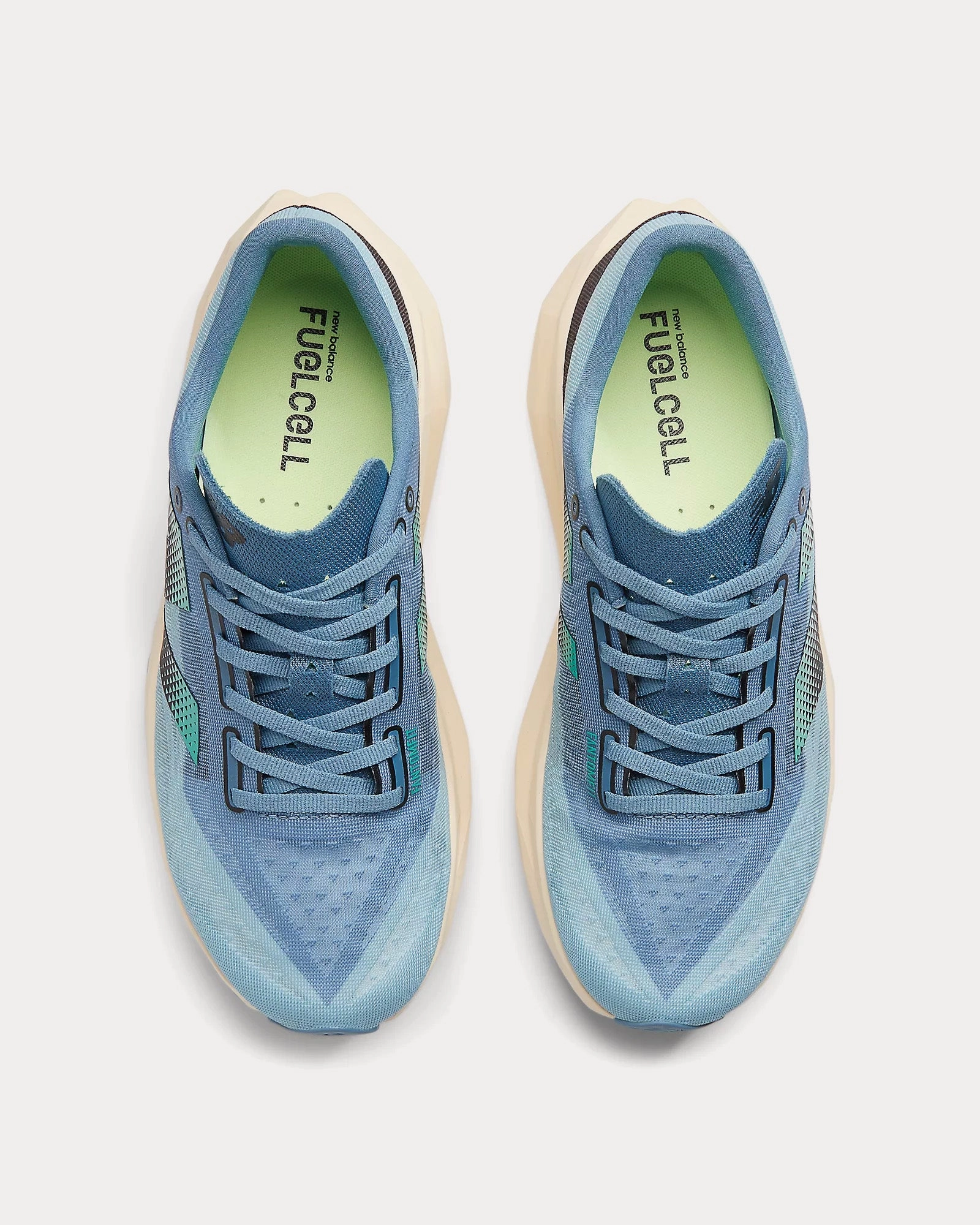 Ct302 New Balance Women's FuelCell Rebel v4 Heron Blue / Chrome Blue / Black Running Shoes