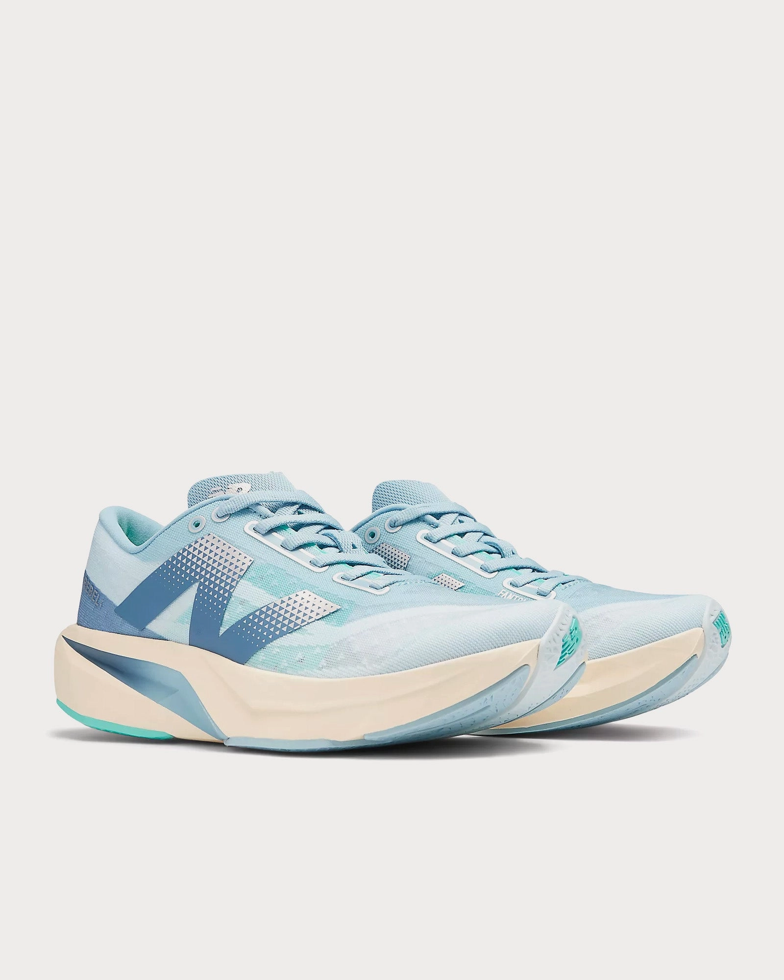 New Balance Wide Women FuelCell Rebel v4 Quarry Blue / Chrome Blue/ Heron Blue Running Shoes
