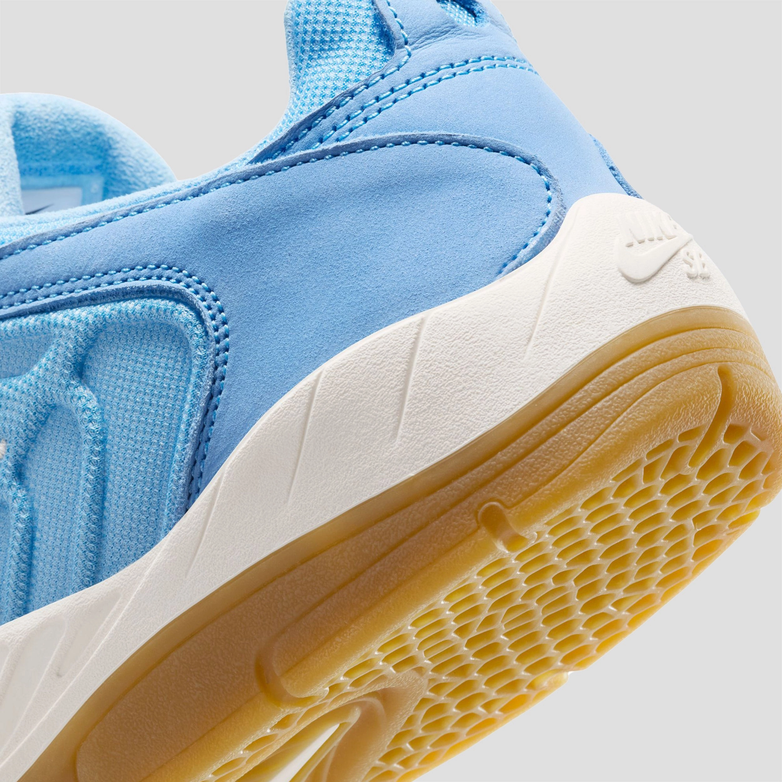 Best Budget Asics Running Shoe Nike SB Vertebrae Skate Shoes University Blue / Sail